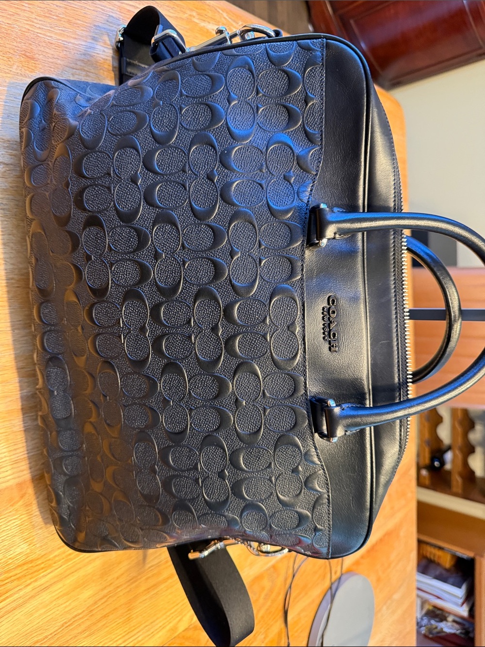 This black leather Coach Beckett Slim Brief